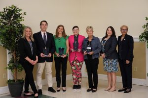 A single group of recipients of the Delaware Award for Excellence and Commitment in State Service at the Governor's Awards Ceremony.