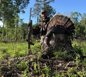 Kyle Magdziuk, a biologist with DNREC conservation partner Tall Timbers, bagged a gobbler this season on public land, at Taber State Forest near Harrington /DNREC photo